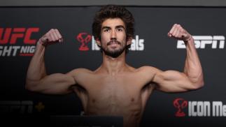 LAS VEGAS, NEVADA - MAY 13: Louis Smolka poses on the scale during the UFC Fight Night weigh-in at UFC APEX on May 13, 2022 in Las Vegas, Nevada. (Photo by Jeff Bottari/Zuffa LLC)