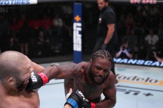 LAS VEGAS, NEVADA - MAY 14: (R-L) Ryan Spann punches Ion Cutelaba of Moldova in a light heavyweight fight at UFC APEX on May 14, 2022 in Las Vegas, Nevada. (Photo by Jeff Bottari/Zuffa LLC)