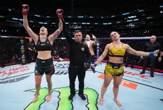 Macy Chiasson (L) reacts after her split-decision victory over Norma Dumont of Brazil in a featherweight fight during the UFC 274 event at Footprint Center on May 07, 2022 in Phoenix, Arizona. (Photo by Chris Unger/Zuffa LLC)