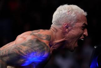 Charles Oliveira of Brazil reacts after his submission victory over Justin Gaethje in the UFC lightweight championship fight during the UFC 274 event at Footprint Center on May 07, 2022 in Phoenix, Arizona. (Photo by Chris Unger/Zuffa LLC)