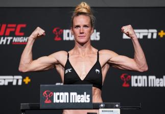 Holly Holm poses on the scale during the UFC weigh-in at UFC APEX on May 20, 2022 in Las Vegas, Nevada. (Photo by Chris Unger/Zuffa LLC)