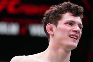 Chase Hooper reacts after his TKO victory over Felipe Colares of Brazil in a featherweight bout during the UFC Fight Night event at UFC APEX on May 21, 2022 in Las Vegas, Nevada. (Photo by Chris Unger/Zuffa LLC)
