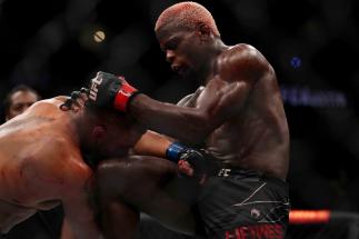 Phil Hawes knees Deron Winn in a middleweight fight during the UFC Fight Night event
