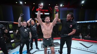 Lightweight Thiago Moises Reacts With Michael Bisping After His Submission Victory Over Christos Giagos At UFC Fight Night: Tsarukyan vs Gamrot On June 25, 2022