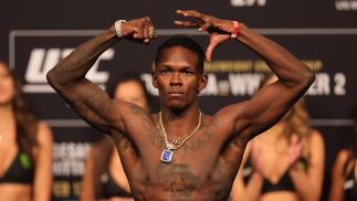 Israel Adesanya of Nigeria weighs in prior to UFC 271 at Toyota Center on February 11, 2022 in Houston, Texas. (Photo by Carmen Mandato/Getty Images)