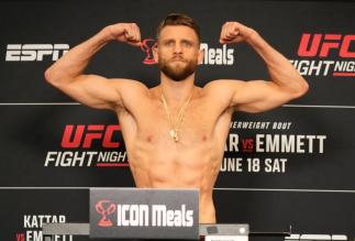 Calvin Kattar poses on the scale during the UFC Fight Night official weigh-in at the DoubleTree Hotel on June 17, 2022 in Austin, Texas. (Photo by Mike Roach/Zuffa LLC)