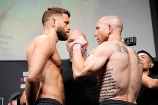 AUSTIN, TEXAS - JUNE 17: (L-R) Calvin Kattar and Josh Emmett face off during the UFC Fight Night ceremonial weigh-in at Moody Center on June 17, 2022 in Austin, Texas. (Photo by Mike Roach/Zuffa LLC)