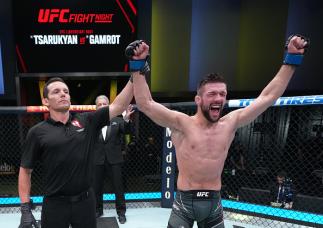 Lightweight Mateusz Gamrot Reacts With Michael Bisping After His Five Round Unanimous Decision Victory Over Arman Tsarukyan At UFC Fight Night: Tsarukyan vs Gamrot On June 25, 2022