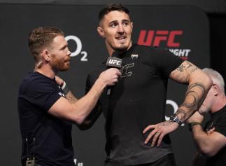 Tom Aspinall of England is interviewed by Paul Felder during the UFC Fight Night ceremonial weigh-in at O2 Arena on March 18, 2022 in London, England. (Photo by Chris Unger/Zuffa LLC)