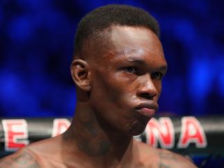 LAS VEGAS, NEVADA - JULY 02: Israel Adesanya of Nigeria enters the Octagon in the UFC middleweight championship fight during the UFC 276 event at T-Mobile Arena on July 02, 2022 in Las Vegas, Nevada. (Photo by Jeff Bottari/Zuffa LLC)