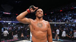 Ciryl Gane of France celebrates his KO victory over Tai Tuivasa of Australia in a heavyweight fight during the UFC Fight Night event at The Accor Arena on September 03, 2022 in Paris, France. (Photo by Jeff Bottari/Zuffa LLC)