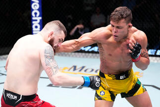 ) Caio Borralho of Brazil punches Michal Oleksiejczuk of Poland in a middleweight fight during the UFC Fight Night event at UFC APEX on April 29, 2023 in Las Vegas, Nevada. (Photo by Jeff Bottari/Zuffa LLC)