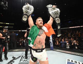 NEW YORK, NY - NOVEMBER 12: UFC lightweight and featherweight champion Conor McGregor of Ireland celebrates after defeating Eddie Alvarez in their UFC