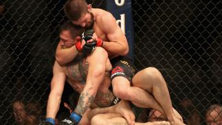 LAS VEGAS, NV - OCTOBER 06: Conor McGregor of Ireland is held by Khabib Nurmagomedov of Russia before submitting in defeat in their UFC lightweight championship bout during the UFC 229 event inside T-Mobile Arena on October 6, 2018 in Las Vegas, Nevada.