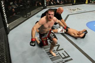 UFC 124: Jim Miller celebrates his win.