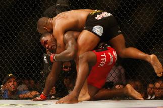 LAS VEGAS, NV - MAY 23: Daniel Cormier (top) attempts to submit Anthony Johnson in their UFC light heavyweight championship bout during the UFC 187 event at the MGM Grand Garden Arena on May 23, 2015 in Las Vegas, Nevada. (Photo by Christian Petersen/Zu