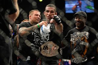 MEXICO CITY, MEXICO - NOVEMBER 15: Fabricio Werdum celebrates with his corner after defeating Mark Hunt in their interim UFC heavyweight championship bout during the UFC 180 event at Arena Ciudad de Mexico on November 15, 2014 in Mexico City, Mexico. (P