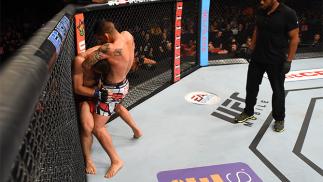 MEXICO CITY, MEXICO - JUNE 13: (R-L) Efrain Escudero of Mexico attempts to submit Drew Dober of the United States in their lightweight bout during the UFC 188 event at the Arena Ciudad de Mexico on June 13, 2015 in Mexico City, Mexico. (Photo by Josh Hedg