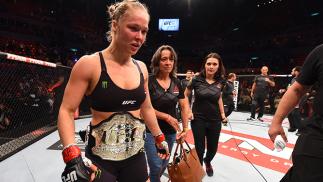 RIO DE JANEIRO, BRAZIL - AUGUST 01: Ronda Rousey of the United States celebrates her knock out victory over Bethe Correia of Brazil in the first round in their UFC women's bantamweight championship bout during the UFC 190 event inside HSBC Arena on Augus