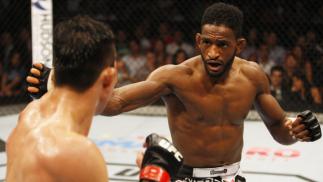 MANILA, PHILIPPINES - MAY 16: Neil Magny of the United States squares off with Hyun Gyu Lim of South Korea in their welterweight fight during the UFC Fight Night event at the Mall of Asia Arena on May 16, 2015 in Manila, Philippines. (Photo by Mitch Vique