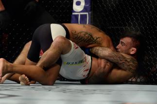 LAS VEGAS, NV - SEPTEMBER 05: John Lineker (bottom) attempts to submit Francisco Rivera in their bantamweight bout during the UFC 191 event inside MGM Grand Garden Arena on September 5, 2015 in Las Vegas, Nevada. (Photo by Brandon Magnus/Zuffa LLC/Zuffa