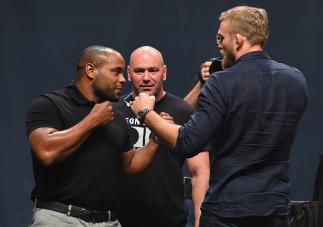 LAS VEGAS, NV - SEPTEMBER 04: (L-R) UFC light heavyweight champion Daniel Cormier and Alex Gustafsson face off during the UFC's Go Big launch event inside MGM Grand Garden Arena on September 4, 2015 in Las Vegas, Nevada. (Photo by Josh Hedges/Zuffa LLC/