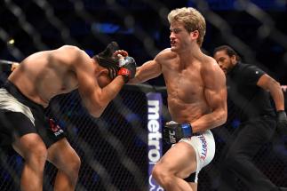 HOUSTON, TX - OCTOBER 03: (R-L) Sage Northcutt punches Francisco Trevino in their lightweight bout during the UFC 192 event at the Toyota Center on October 3, 2015 in Houston, Texas. (Photo by Jeff Bottari/Zuffa LLC/Zuffa LLC via Getty Images)