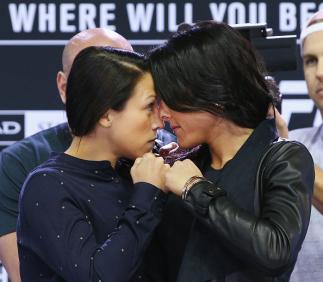 MELBOURNE, AUSTRALIA - SEPTEMBER 16: Joanna Jedrzejczyk (L) and Valerie Letourneau face off during the UFC 193 media event at Etihad Stadium on September 16, 2015 in Melbourne, Australia. (Photo by Michael Dodge/Zuffa LLC/Zuffa LLC via Getty Images)