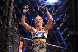MELBOURNE, AUSTRALIA - NOVEMBER 15: Holly Holm of the United States celebrates victory over Ronda Rousey of the United States in their UFC women's bantamweight championship bout during the UFC 193 event at Etihad Stadium on November 15, 2015 in Melbourne