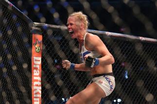 MELBOURNE, AUSTRALIA - NOVEMBER 15: Holly Holm of the United States celebrates victory over Ronda Rousey of the United States in their UFC women's bantamweight championship bout during the UFC 193 event at Etihad Stadium on November 15, 2015 in Melbourne