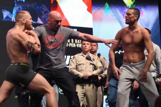 LAS VEGAS, NV - MARCH 04: (L-R) Opponents Conor McGregor of Ireland and Nate Diaz face off during the UFC 196 Weigh-in at the MGM Grand Garden Arena on March 4, 2016 in Las Vegas, Nevada. (Photo by Josh Hedges/Zuffa LLC/Zuffa LLC via Getty Images)