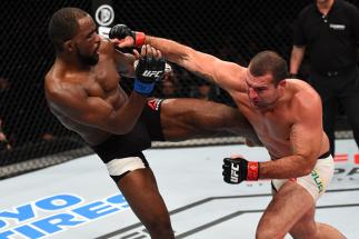 CURITIBA, BRAZIL - MAY 14: (R-L) Mauricio 'Shogun' Rua of Brazil punches Corey Anderson in their light heavyweight bout during the UFC 198 event at Arena da Baixada stadium on May 14, 2016 in Curitiba, Parana, Brazil. (Photo by Josh Hedges/Zuffa LLC/Zuf