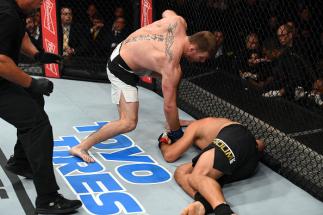CURITIBA, BRAZIL - MAY 14: (L-R) Stipe Miocic punches Fabricio Werdum of Brazil in their UFC heavyweight championship bout during the UFC 198 event at Arena da Baixada stadium on May 14, 2016 in Curitiba, Parana, Brazil. (Photo by Josh Hedges/Zuffa LLC/