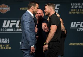 INGLEWOOD, CA - JUNE 02: (L-R) Middleweight champion Luke Rockhold and Michael Bisping face off during the UFC 199: Press Conference at the Forum on June 2, 2016 in Inglewood, California. (Photo by Brandon Magnus/Zuffa LLC/Zuffa LLC via Getty Images)