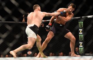 INGLEWOOD, CA - JUNE 04: Michael Bisping of England throws a right at Luke Rockhold during the UFC 199 event at The Forum on June 4, 2016 in Inglewood, California. (Photo by Jeff Bottari/Zuffa LLC/Zuffa LLC via Getty Images)