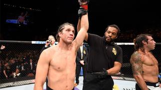 INGLEWOOD, CA - JUNE 04: Brian Ortega celebrates after his TKO win in the third round against Clay Guida in their featherweight bout during the UFC 199 event at The Forum on June 4, 2016 in Inglewood, California. (Photo by Josh Hedges/Zuffa LLC/Zuffa LL