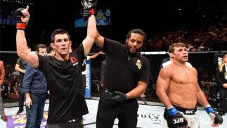 INGLEWOOD, CA - JUNE 04: Dominick Cruz celebrates after defeating Urijah Faber by unanimous decision in their UFC bantamweight championship bout during the UFC 199 event at The Forum on June 4, 2016 in Inglewood, California. (Photo by Josh Hedges/Zuffa