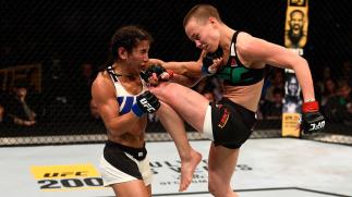 TAMPA, FL - APRIL 16: (R-L) Rose Namajunas knees Tecia Torres in their women's strawweight bout during the UFC Fight Night event at Amalie Arena on April 16, 2016 in Tampa, Florida. (Photo by Jeff Bottari/Zuffa LLC/Zuffa LLC via Getty Images)