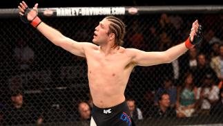 INGLEWOOD, CA - JUNE 04: Brian Ortega celebrates after his TKO in the third round against Clay Guida in their featherweight bout during the UFC 199 event at The Forum on June 4, 2016 in Inglewood, California. (Photo by Josh Hedges/Zuffa LLC/Zuffa LLC vi