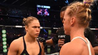 MELBOURNE, AUSTRALIA - NOVEMBER 15: (L-R) Ronda Rousey and Holly Holm meet in the center of the Octagon before their UFC women's bantamweight championship bout during the UFC 193 event at Etihad Stadium on November 15, 2015 in Melbourne, Australia. (Pho