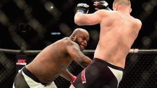 LAS VEGAS, NV - FEBRUARY 06: (L-R) Derrick Lewis punches Damian Grabowski of Poland in their heavyweight bout during the UFC Fight Night event at MGM Grand Garden Arena on February 6, 2016 in Las Vegas, Nevada. (Photo by Jared C. Tilton /Zuffa LLC/Zuffa