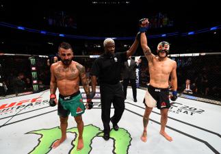 ATLANTA, GA - JULY 30: (R-L) Erik Perez celebrates his victory over Francisco Rivera with a spinning back fistin their bantamweight bout during the UFC 201 event on July 30, 2016 at Philips Arena in Atlanta, Georgia. (Photo by Jeff Bottari/Zuffa LLC/Zuff