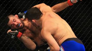 ATLANTA, GA - JULY 30: (R-L) Jake Ellenberger punches Matt Brown in their welterweight bout during the UFC 201 event on July 30, 2016 at Philips Arena in Atlanta, Georgia. (Photo by Daniel Shirey/Zuffa LLC/Zuffa LLC via Getty Images)