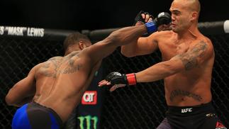 ATLANTA, GA - JULY 30: (L-R) Tyron Woodley delivers a right hand to knock down opponent Robbie Lawler in their welterweight championship bout during the UFC 201 event on July 30, 2016 at Philips Arena in Atlanta, Georgia. (Photo by Daniel Shirey/Zuffa LL