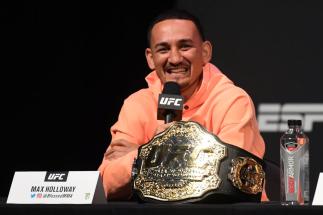 UFC featherweight champion Max Holloway interacts with the media during the UFC seasonal press conference