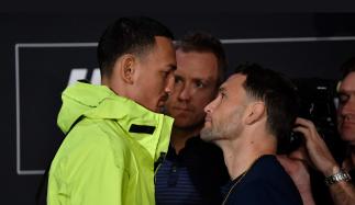 Opponents Max Holloway and Frankie Edgar face off for media during the UFC 240 Ultimate Media Day