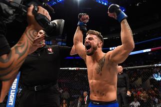LAS VEGAS, NV - AUGUST 20: Mike Perry celebrates after defeating Hyun Gyu Lim of South Korea in their welterweight bout during the UFC 202 event at T-Mobile Arena on August 20, 2016 in Las Vegas, Nevada. (Photo by Josh Hedges/Zuffa LLC/Zuffa LLC via Get