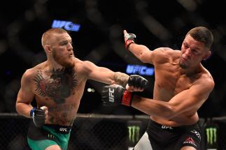 LAS VEGAS, NV - AUGUST 20: Nate Diaz fights Conor McGregor of Ireland in their welterweight bout during the UFC 202 event at T-Mobile Arena on August 20, 2016 in Las Vegas, Nevada. (Photo by Jeff Bottari/Zuffa LLC/Zuffa LLC via Getty Images)
