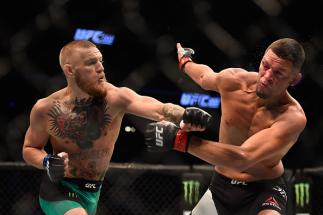 LAS VEGAS, NV - AUGUST 20:  Nate Diaz fights Conor McGregor of Ireland in their welterweight bout during the UFC 202 event at T-Mobile Arena on August 20, 2016 in Las Vegas, Nevada.  (Photo by Jeff Bottari/Zuffa LLC/Zuffa LLC via Getty Images)