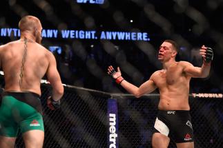 LAS VEGAS, NV - AUGUST 20: Nate Diaz fights Conor McGregor of Ireland in their welterweight bout during the UFC 202 event at T-Mobile Arena on August 20, 2016 in Las Vegas, Nevada. (Photo by Jeff Bottari/Zuffa LLC/Zuffa LLC via Getty Images)